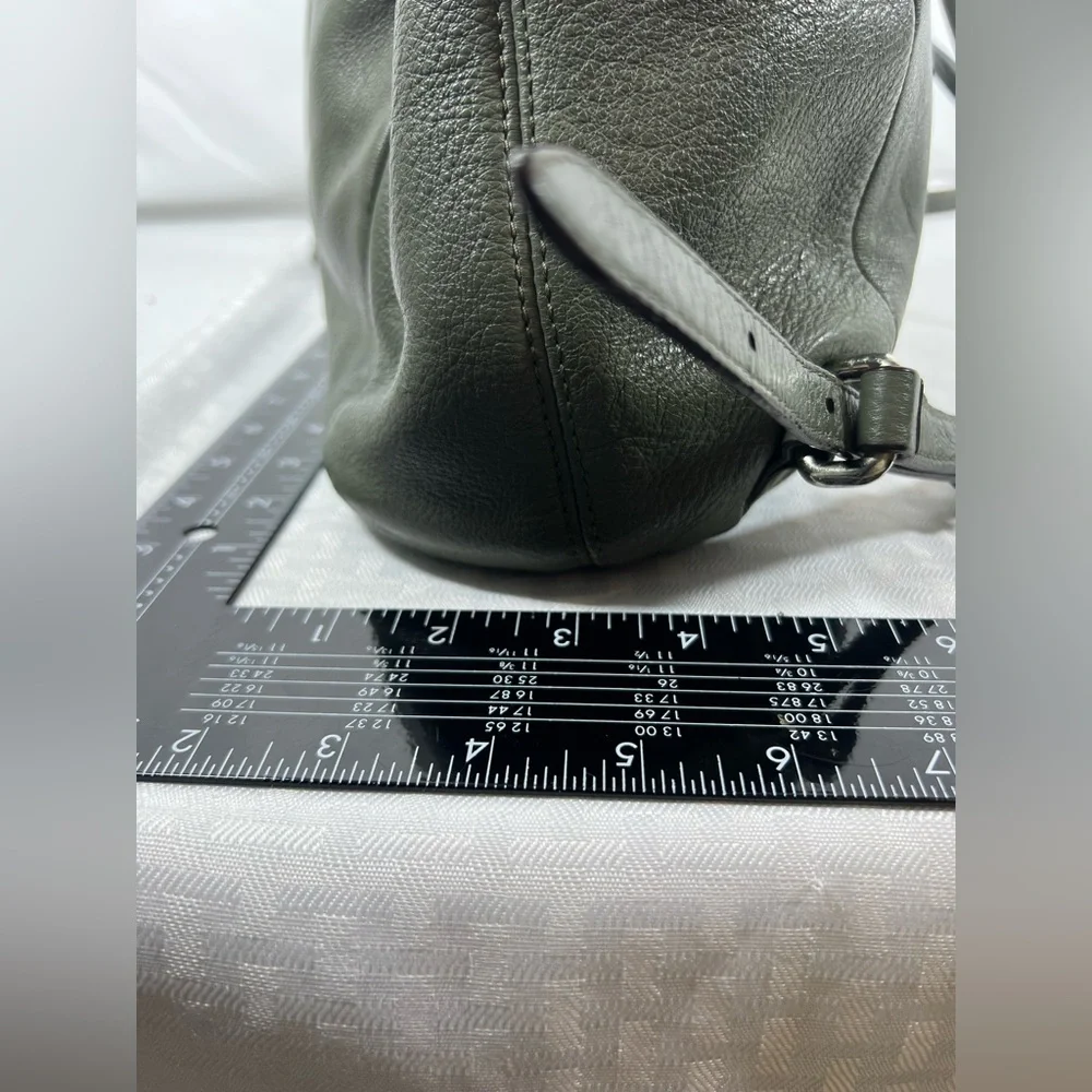 4019: Coach Olive Green Pebbled Leather Drawstring Backpack
